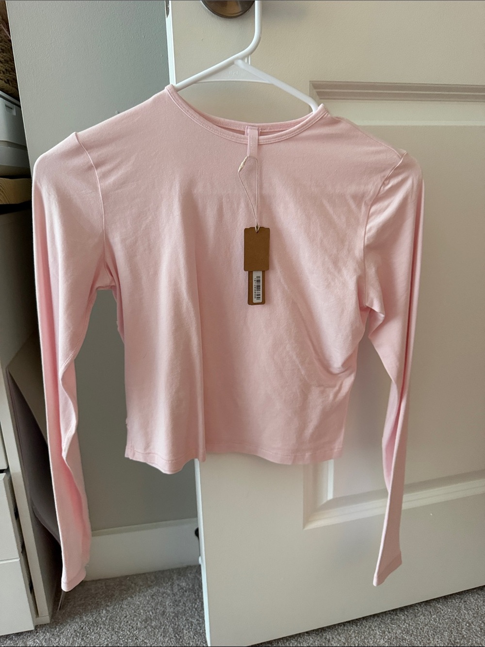 SKIMS Long Sleeve Crewneck Top in Pale Pink
